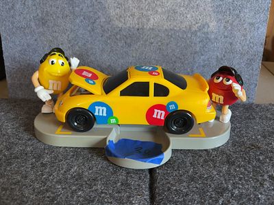 M&M'S Under The Hood Race Car Candy Dispenser. This M&amp;M'S themed collectible is an official 