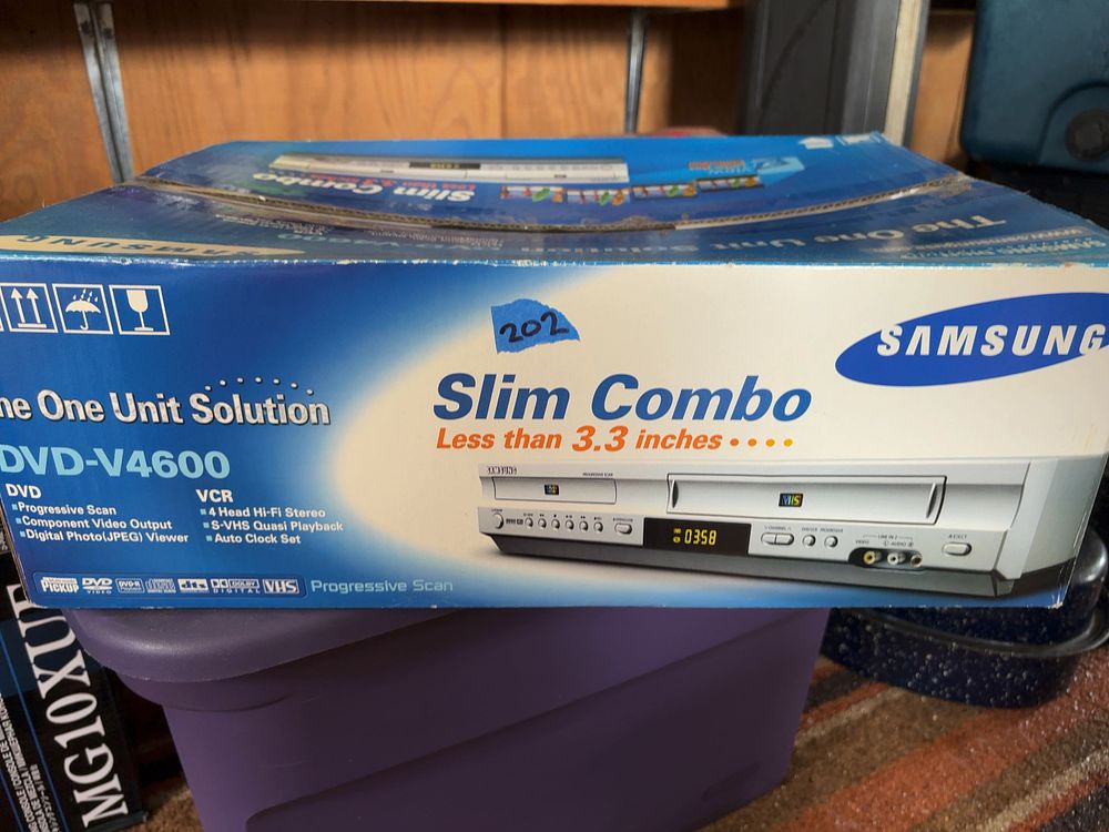 Lot 202: Samsung DVD-V4600 Slim Combo DVD and VCR Player in Original Box Not tested