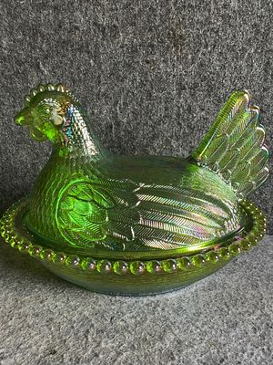 Indiana Glass Iridescent Lime Green Carnival Glass Hen on Nest Covered Dish. Produced by the 
