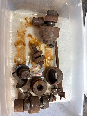 An Assortment of Vintage Greenlee Metal Knockout Punches and Adjustable Hole Cutter. This lot 