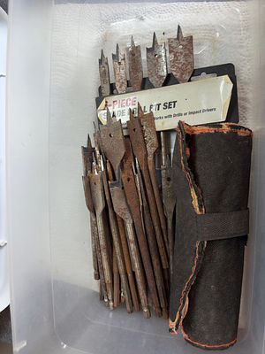 An Assortment of Steel Woodworking Spade Drill Bits with Packaging and Tool Roll. This 