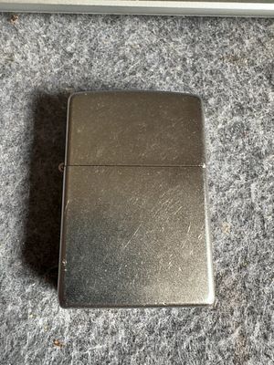 Zippo Satin Chrome Windproof Pocket Lighter, July 2013. A Zippo windproof pocket lighter 