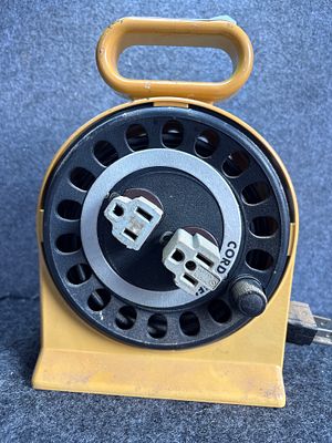 Lomak Model NRS-7-P107(B) Portable Manual Extension Cord Reel with Dual Outlets. This is a 