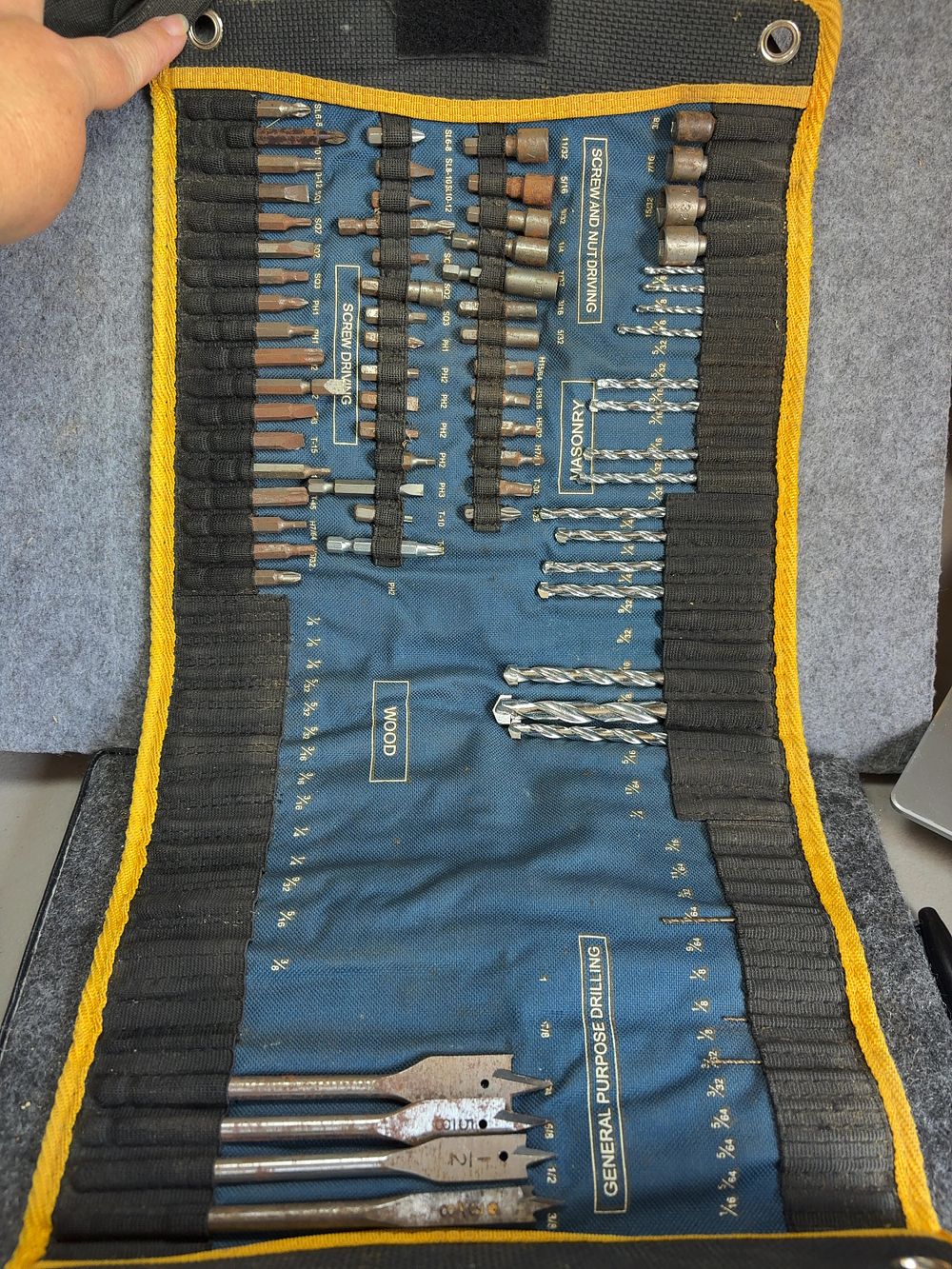 Lot 184: An Assortment of Drill and Driver Bits with a Ryobi Roll-Up Pouch and a DeWalt Index Case