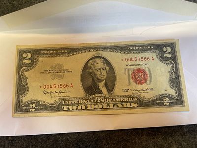 1963 two dollar red seal star note UNC! HIGH GRADE WORTH SENDING TO BE GRADED IN MY OPINION 