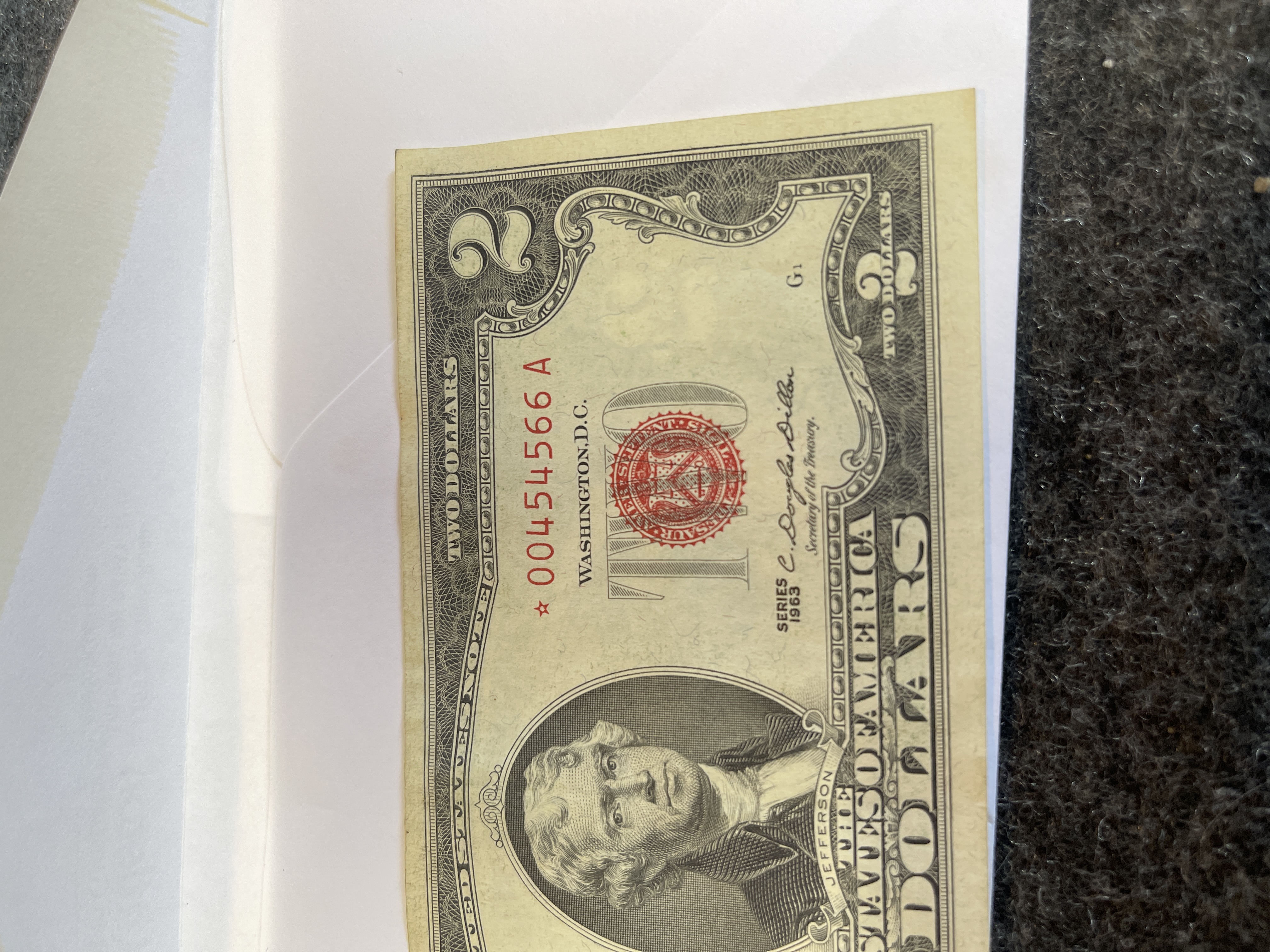 1963 two dollar red seal star note UNC! HIGH GRADE WORTH SENDING TO BE GRADED IN MY OPINION AWESOME CONDTION SEE PICTURES FOR DESCRIPTION AN