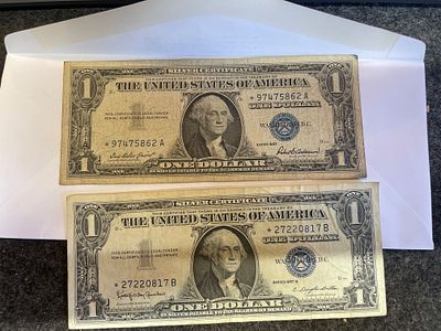 Lot Of 2 - 1957 $1 STAR Note Silver Certificate Blue Seal U.S. One Dollar Bills
CONDITION IS 