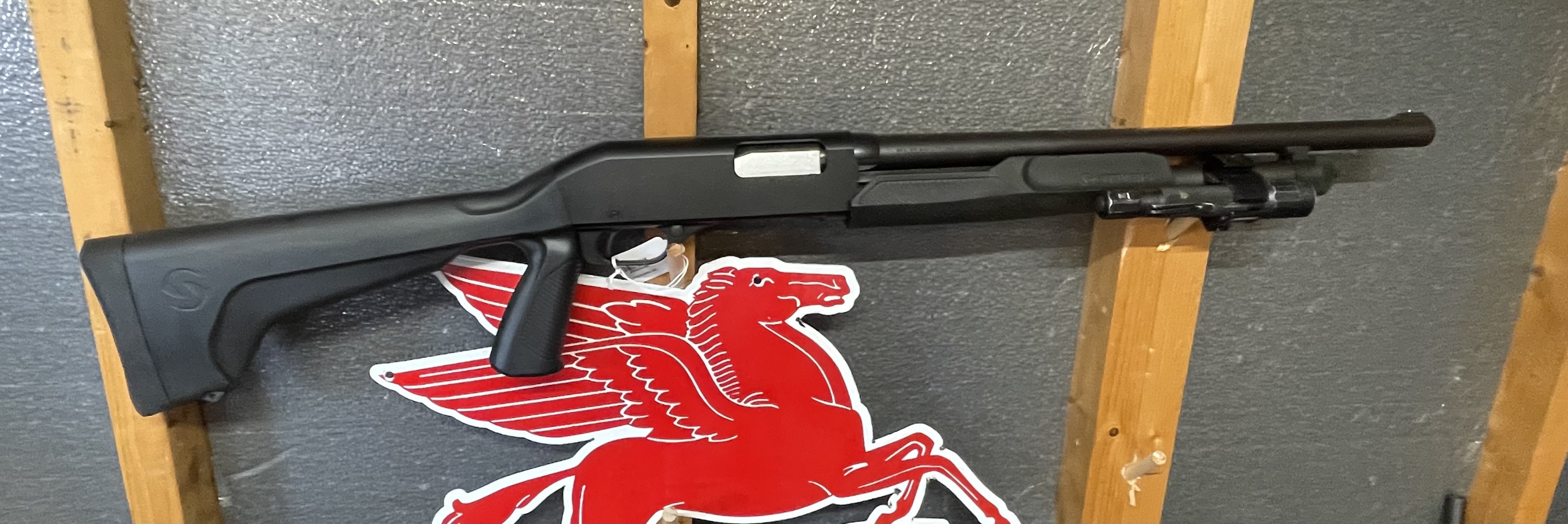 Stevens 320 Security 12 Gauge Pistol Grip Shotgun with Bead Sight and mounted flashlight