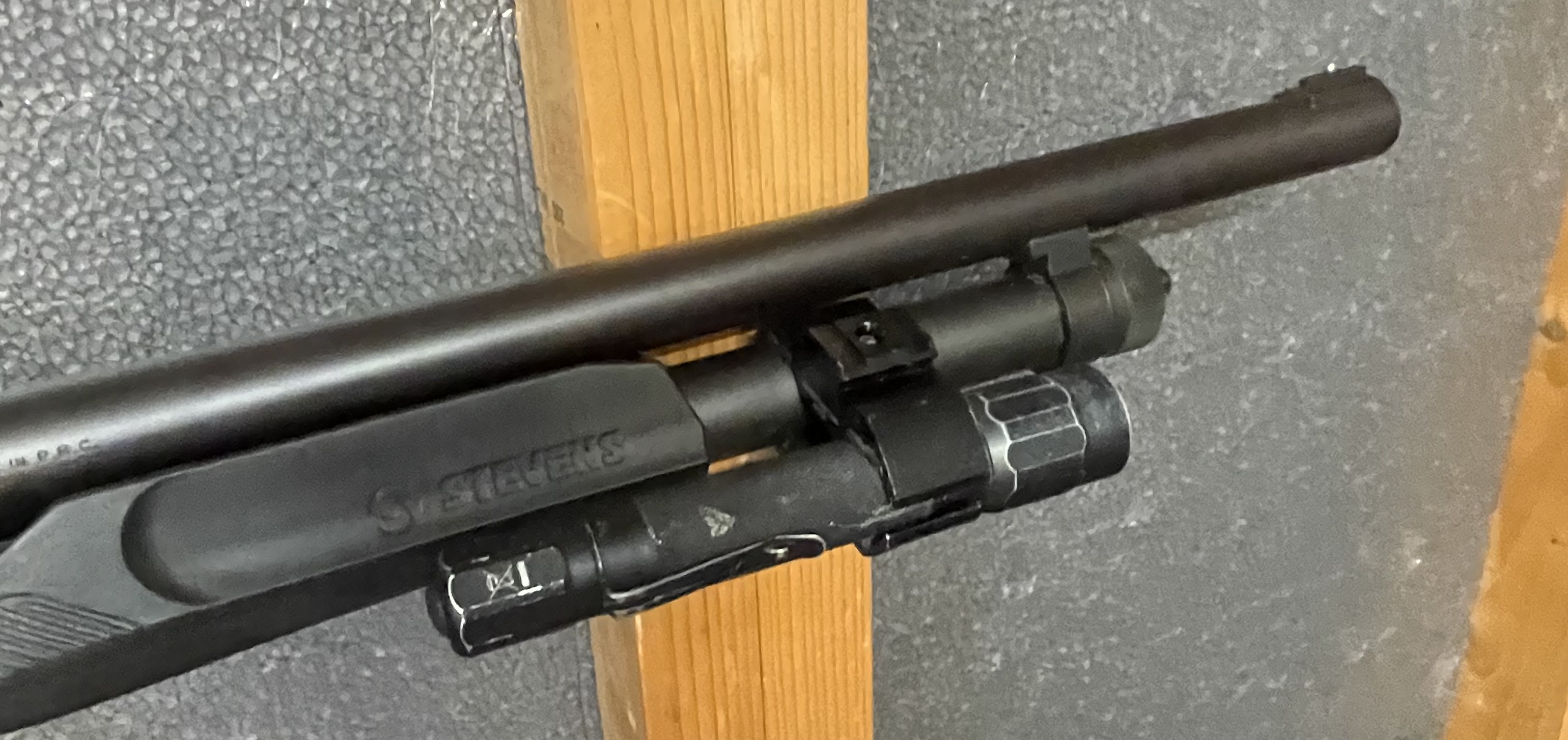 Stevens 320 Security 12 Gauge Pistol Grip Shotgun with Bead Sight and mounted flashlight
