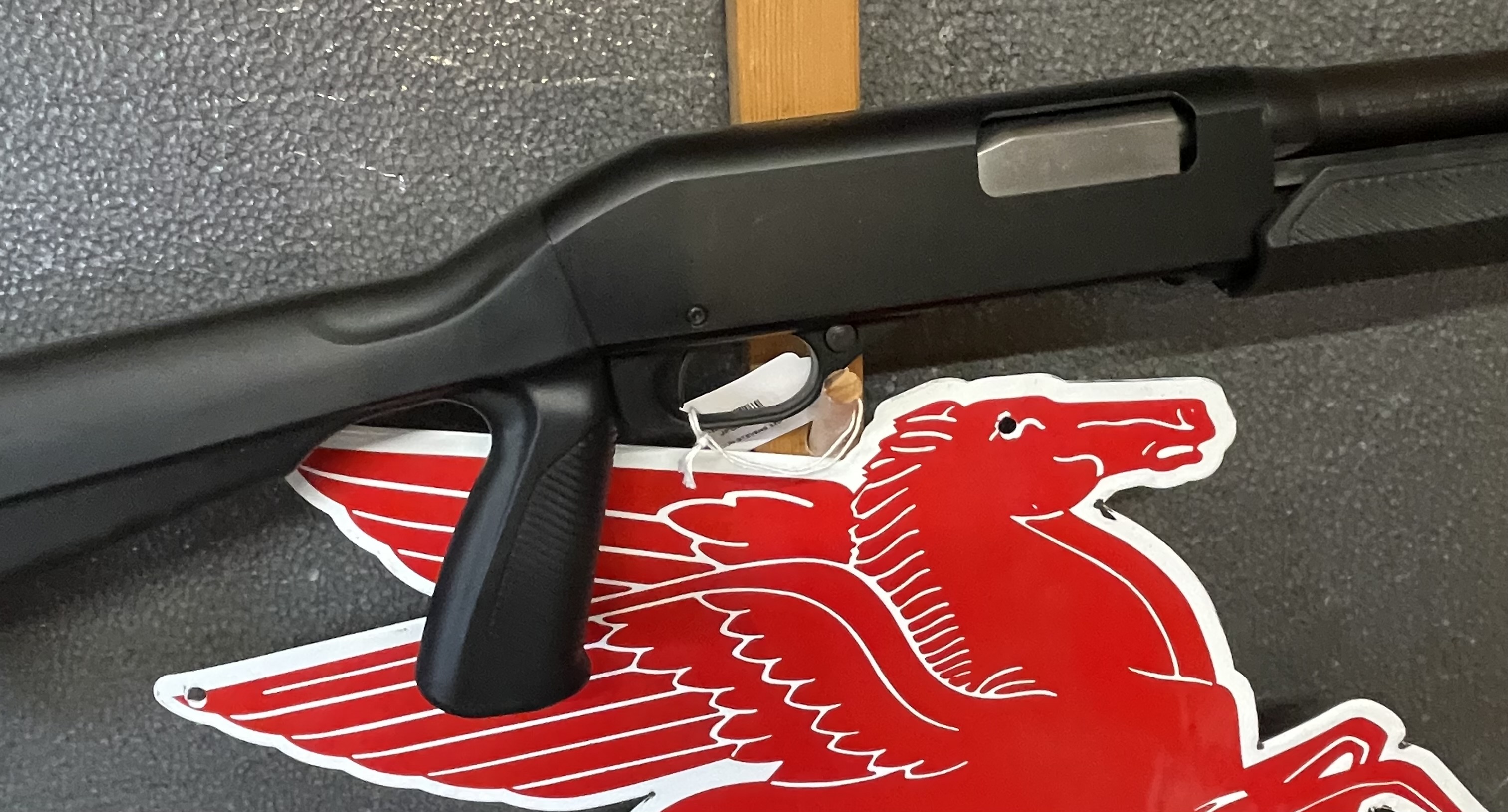 Stevens 320 Security 12 Gauge Pistol Grip Shotgun with Bead Sight and mounted flashlight
