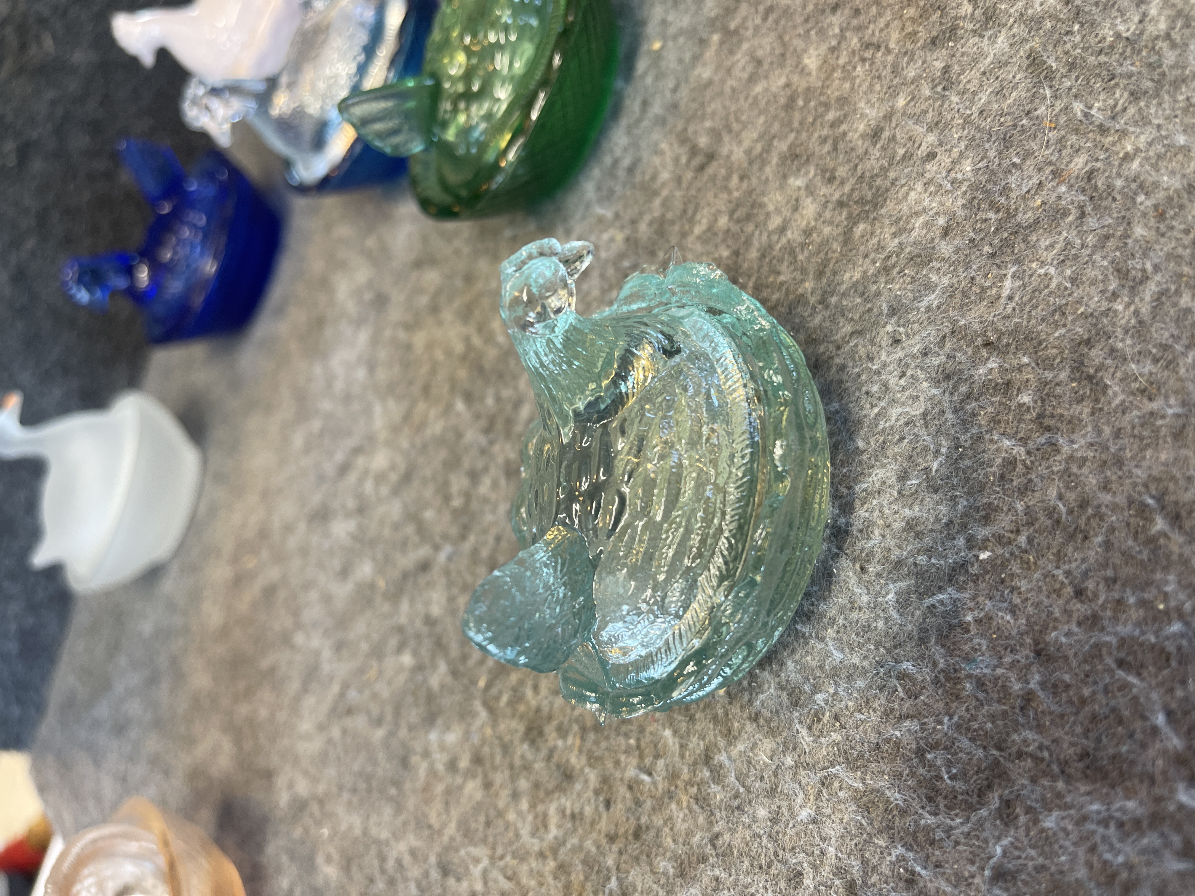 A Collection of Seven Miniature Glass Bird on Nest Salt Cellars