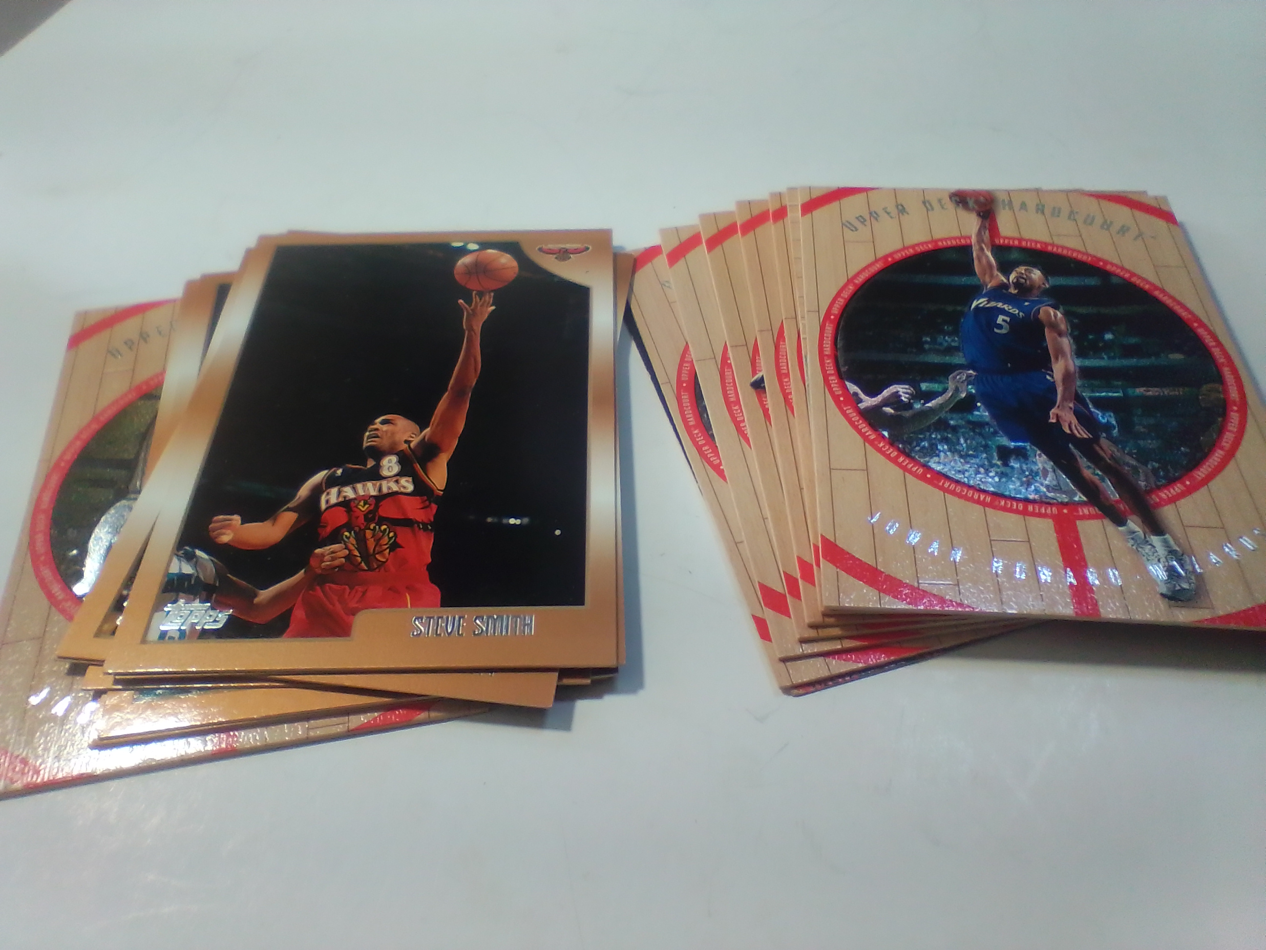 A Collection of Late 1990s NBA Basketball Trading Cards Including Upper Deck Hardcourt and SkyBox Z-Force