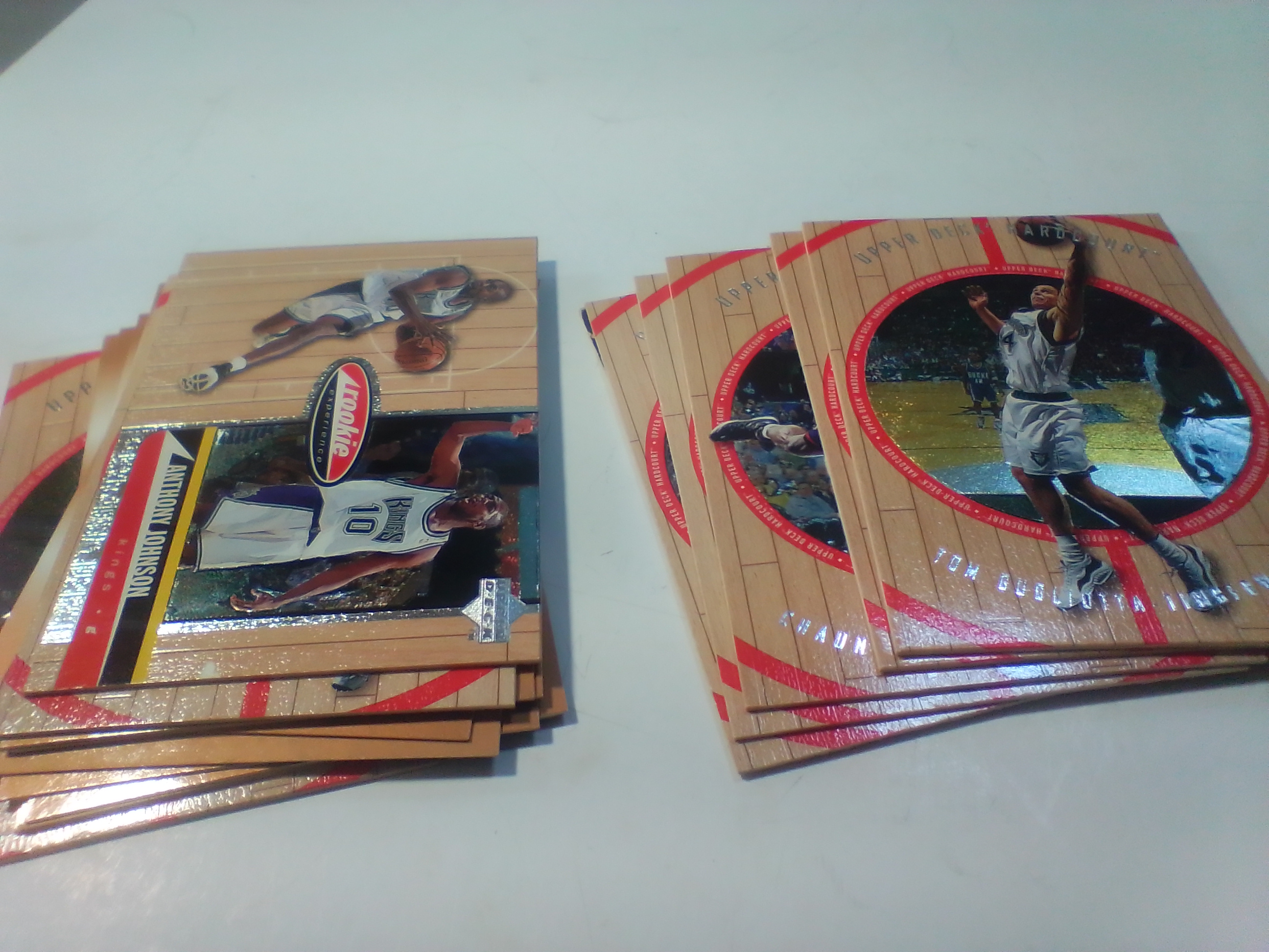 A Collection of Late 1990s NBA Basketball Trading Cards Including Upper Deck Hardcourt and SkyBox Z-Force