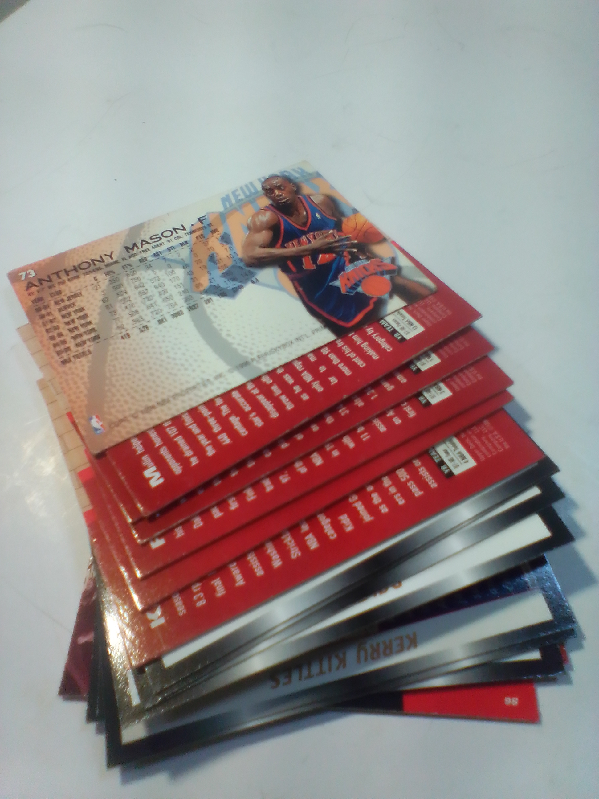 A Collection of Late 1990s NBA Basketball Trading Cards Including Upper Deck Hardcourt and SkyBox Z-Force