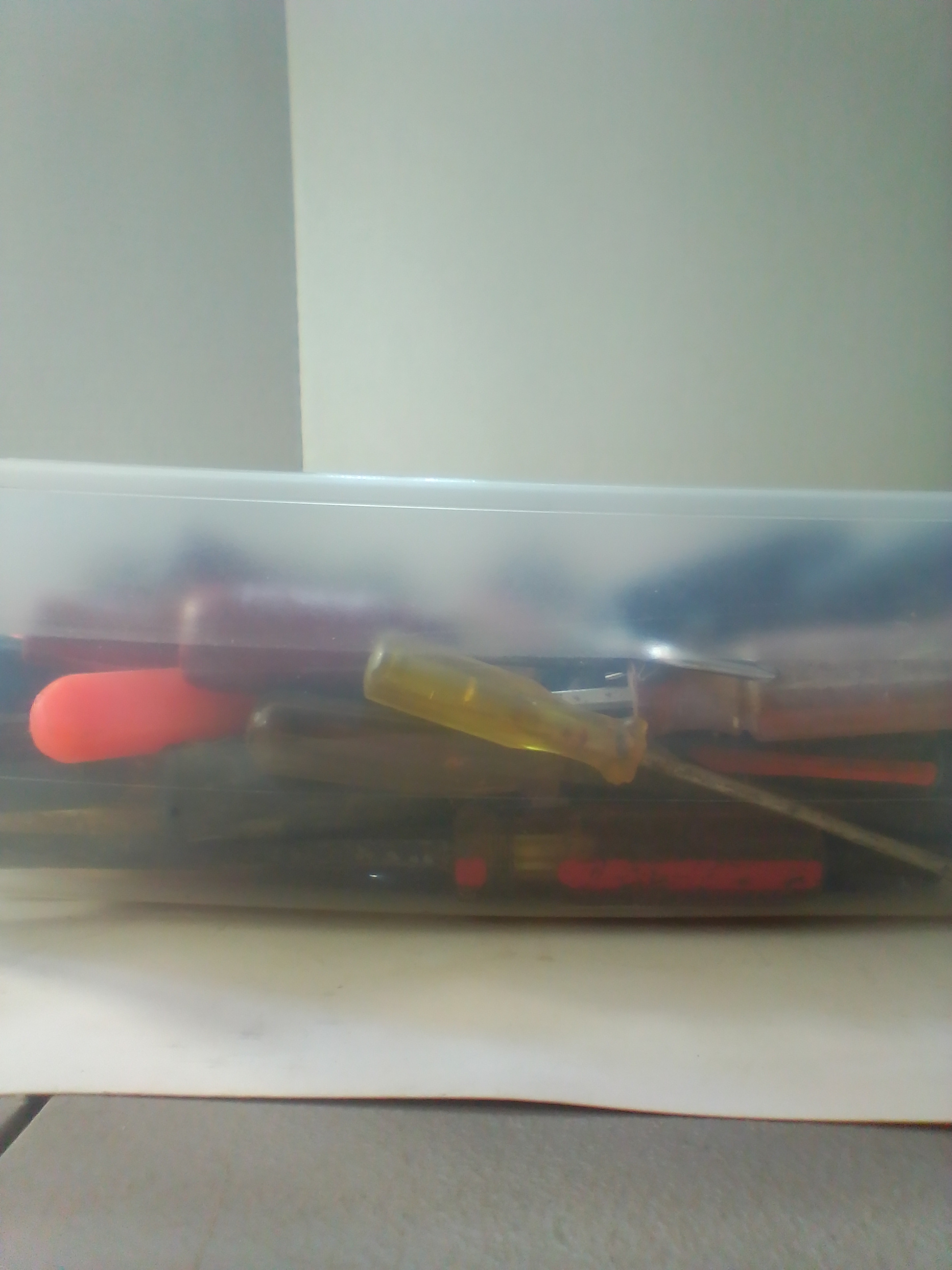 An Assortment of Multi-Brand Hand Tools and Driver Bits in Storage Bin