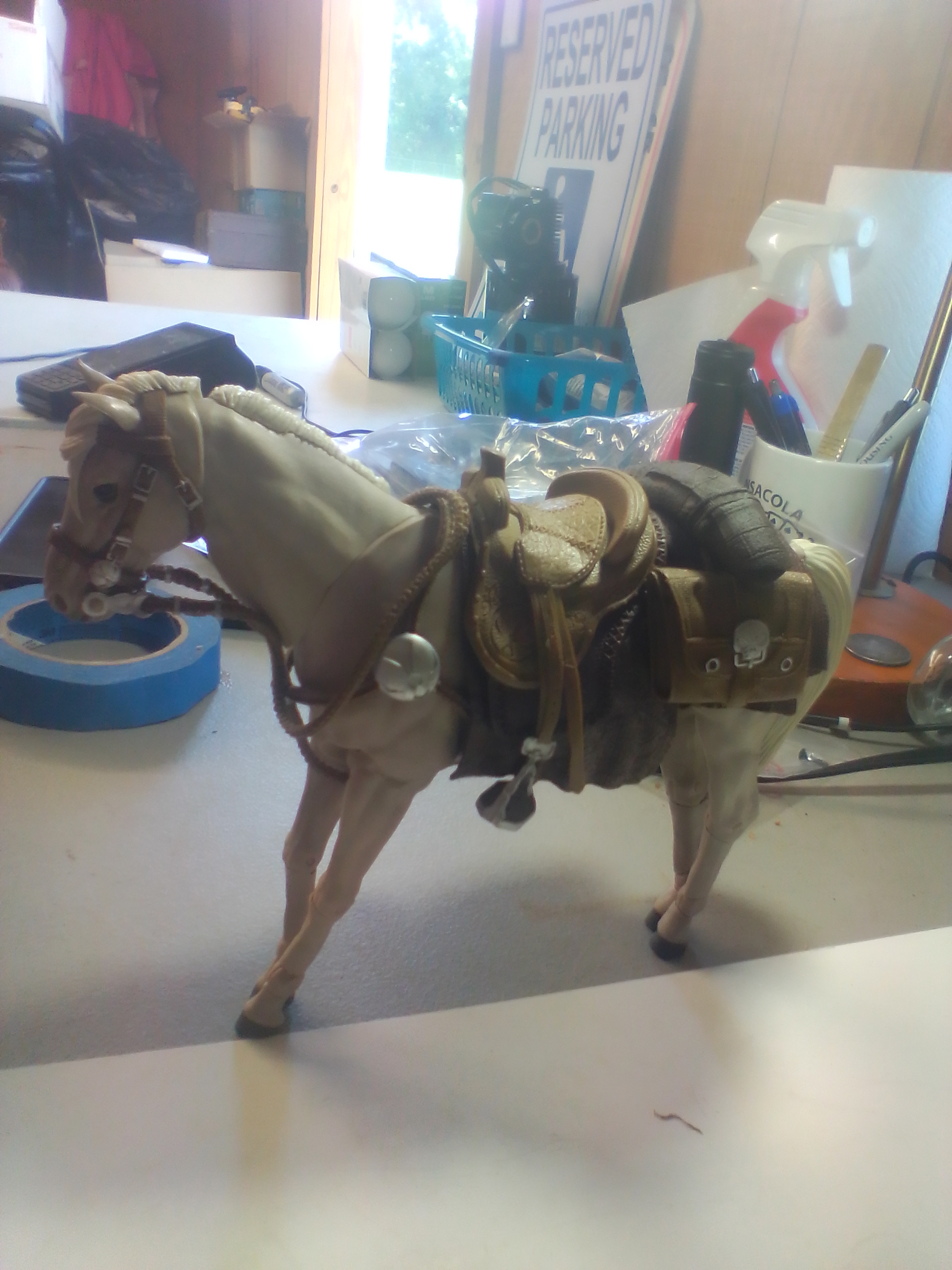 Articulated Model Horse with Western Style Tack and Skull Emblem Saddlebags
