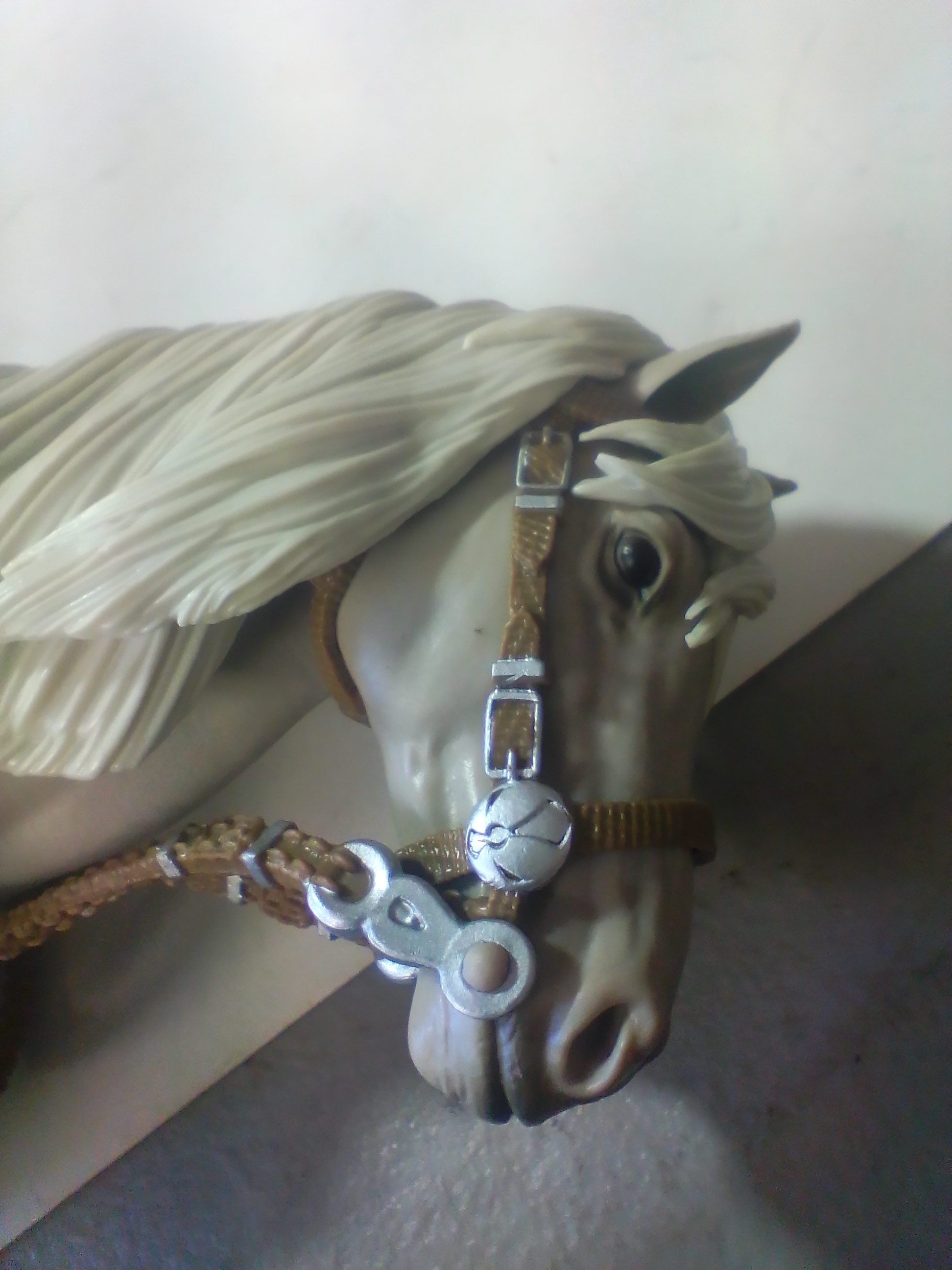 Articulated Model Horse with Western Style Tack and Skull Emblem Saddlebags