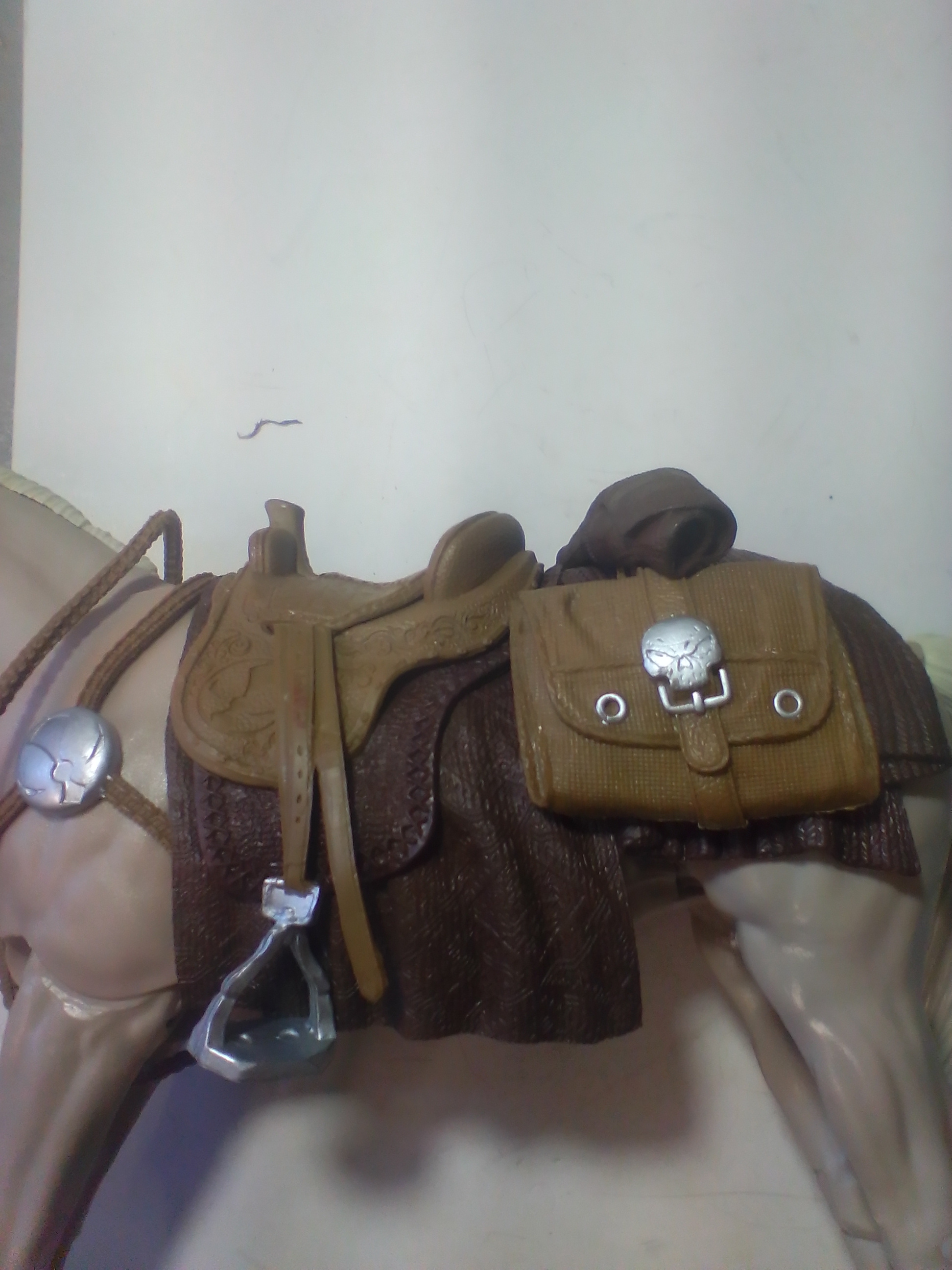 Articulated Model Horse with Western Style Tack and Skull Emblem Saddlebags
