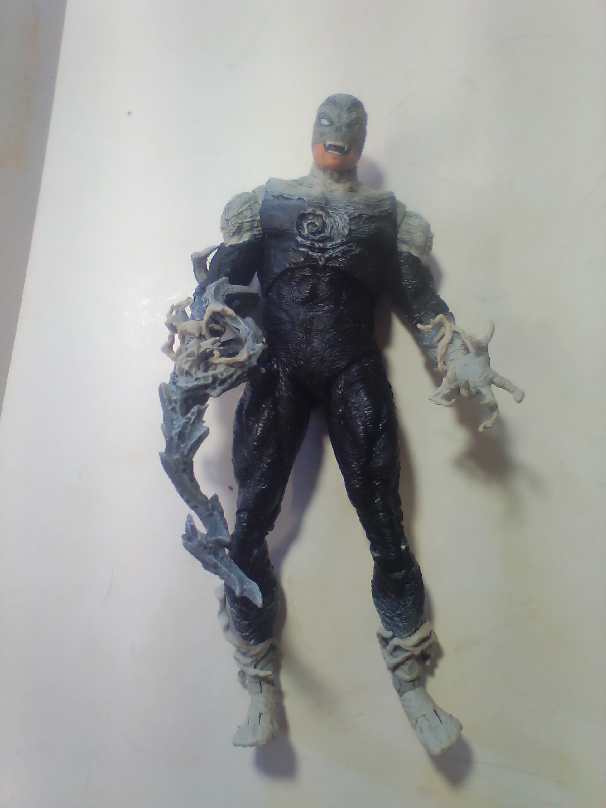 Three McFarlane Toys Spawn Universe 7 Inch Articulated Action Figures A Pair of TMP Intl. LLC Articulated Plastic Spawn Action Figures