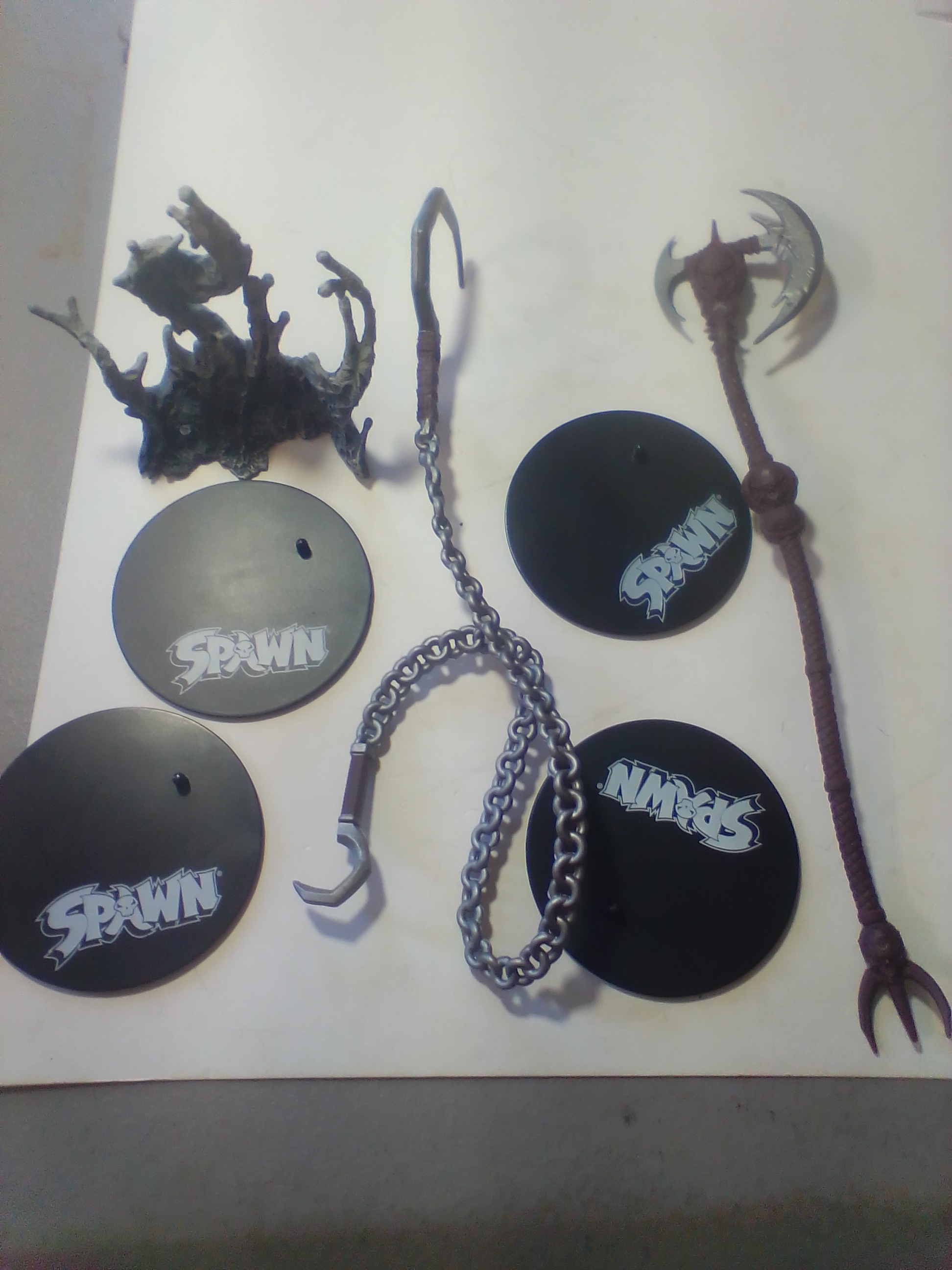 Three McFarlane Toys Spawn Universe 7 Inch Articulated Action Figures A Pair of TMP Intl. LLC Articulated Plastic Spawn Action Figures