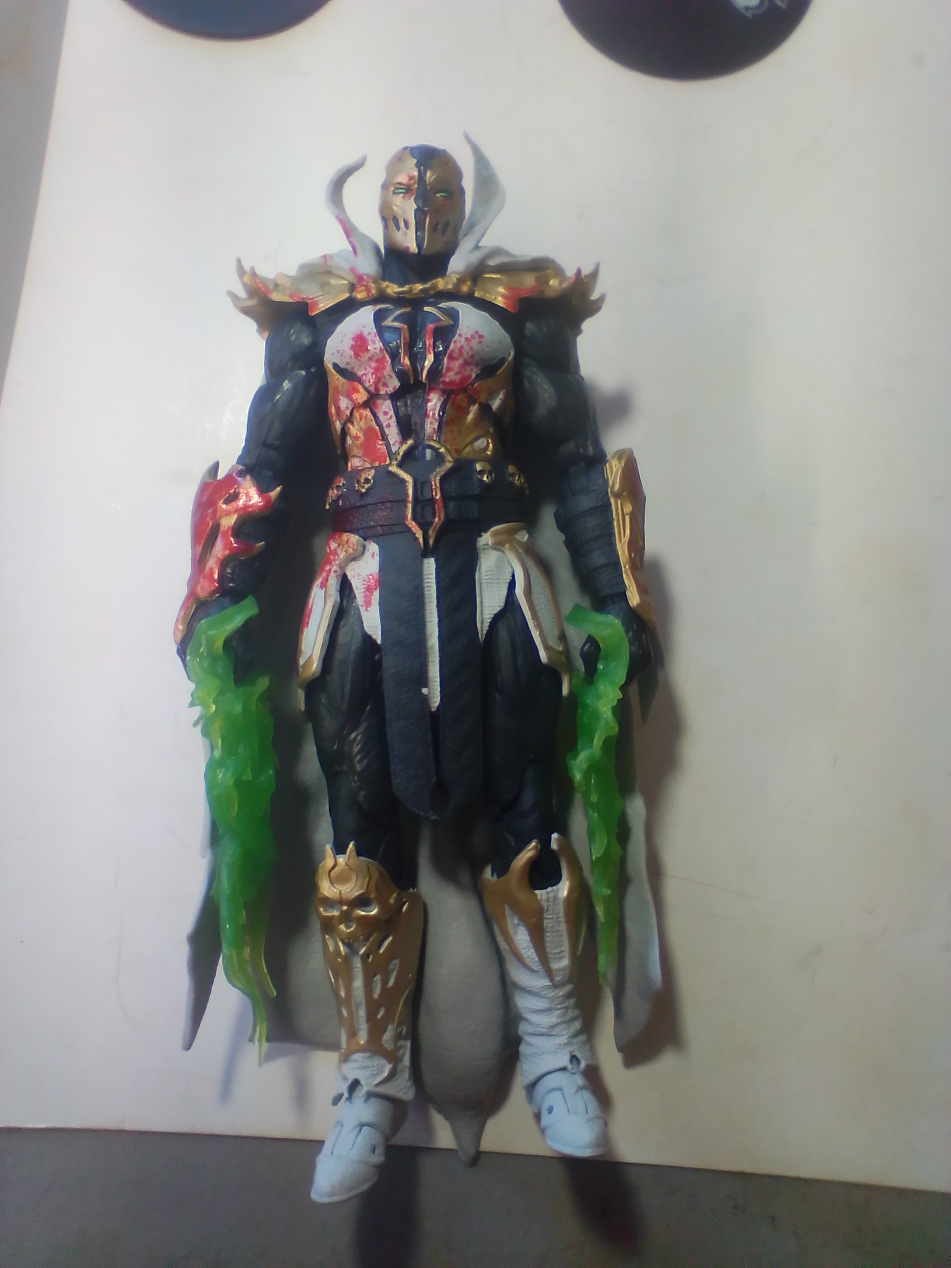 Three Articulated Plastic Action Figures Including Redeemer and Commando Spawn