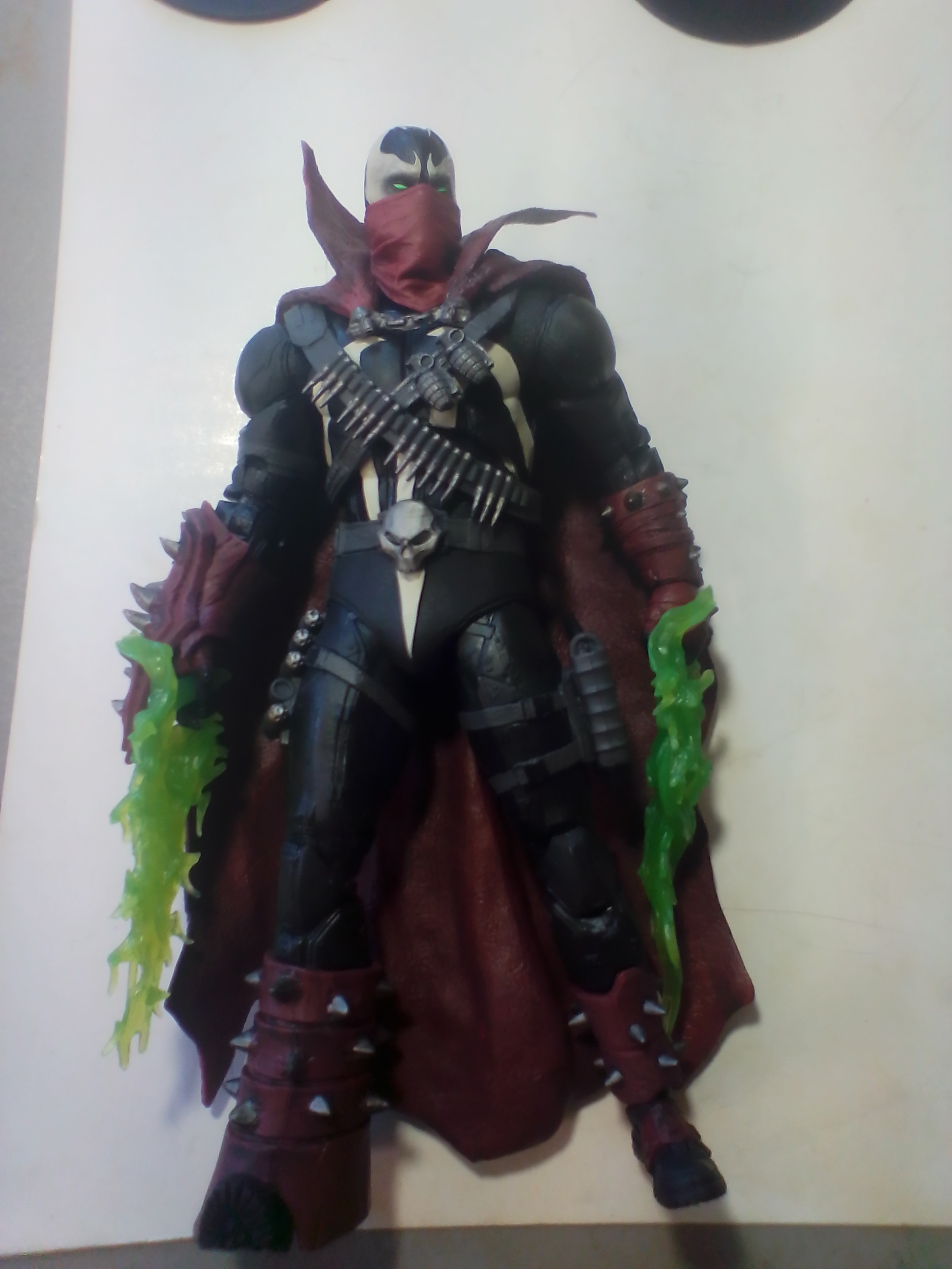 Three Articulated Plastic Action Figures Including Redeemer and Commando Spawn