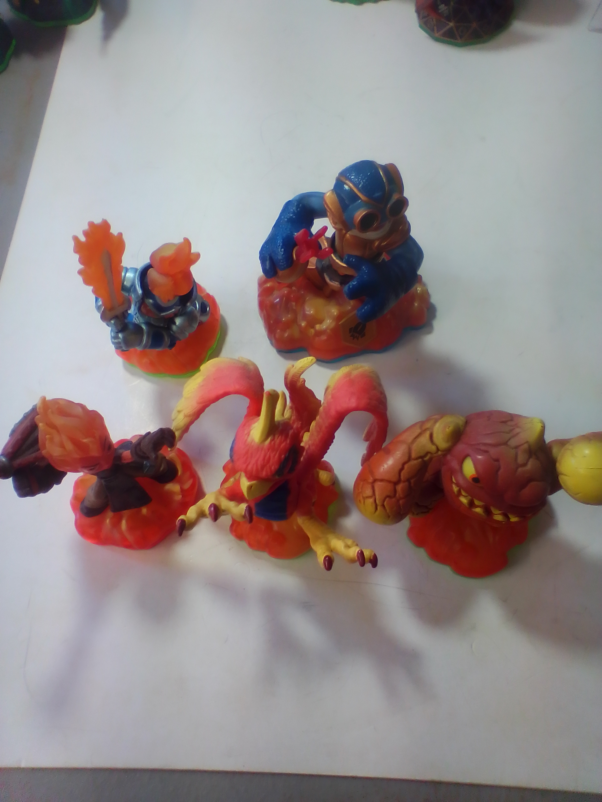 A Collection of Five Skylanders Fire Element Video Game Figurines