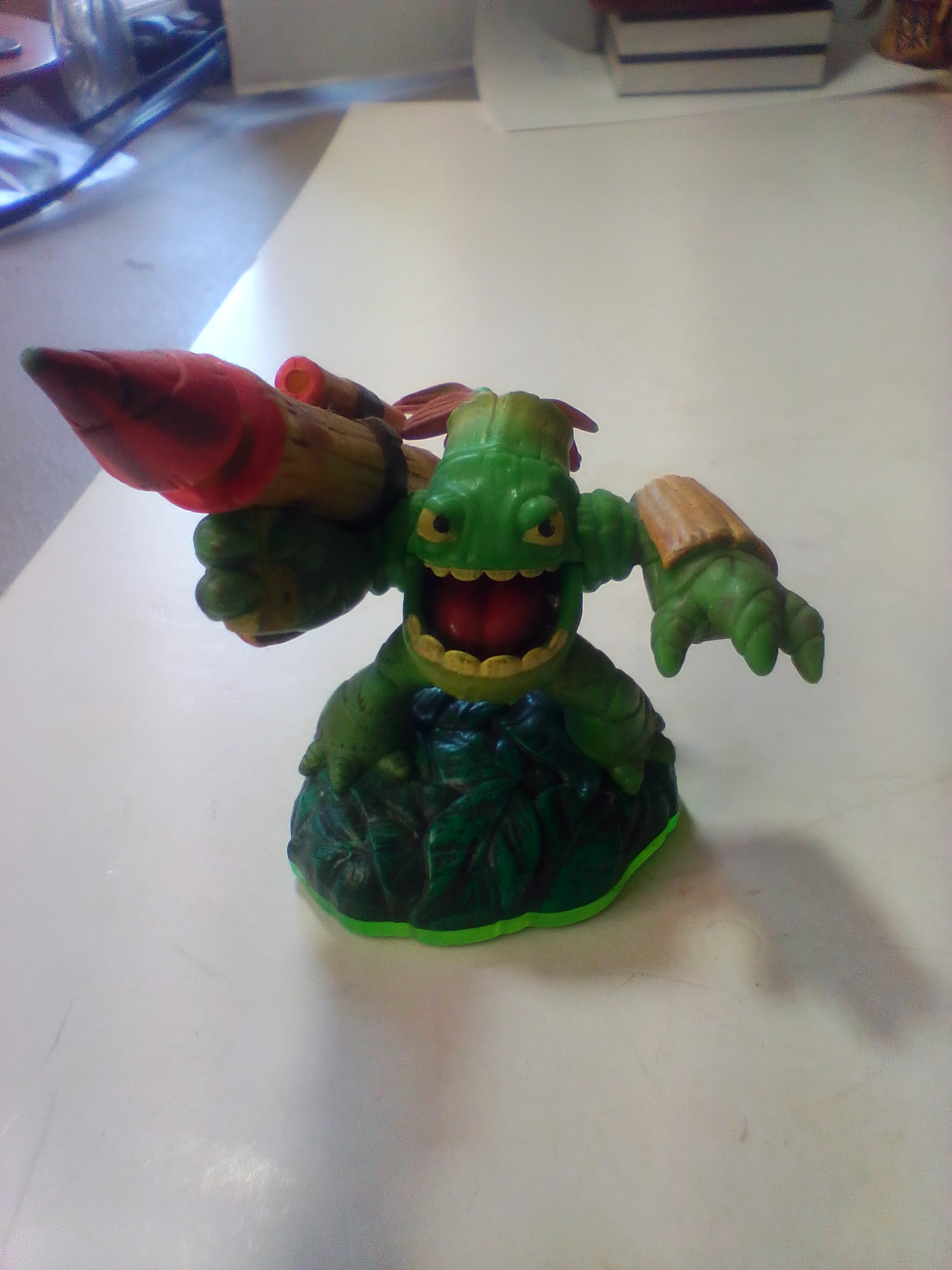 A Collection of Skylanders Interactive Game Figures Including Trap Master Bushwhack
