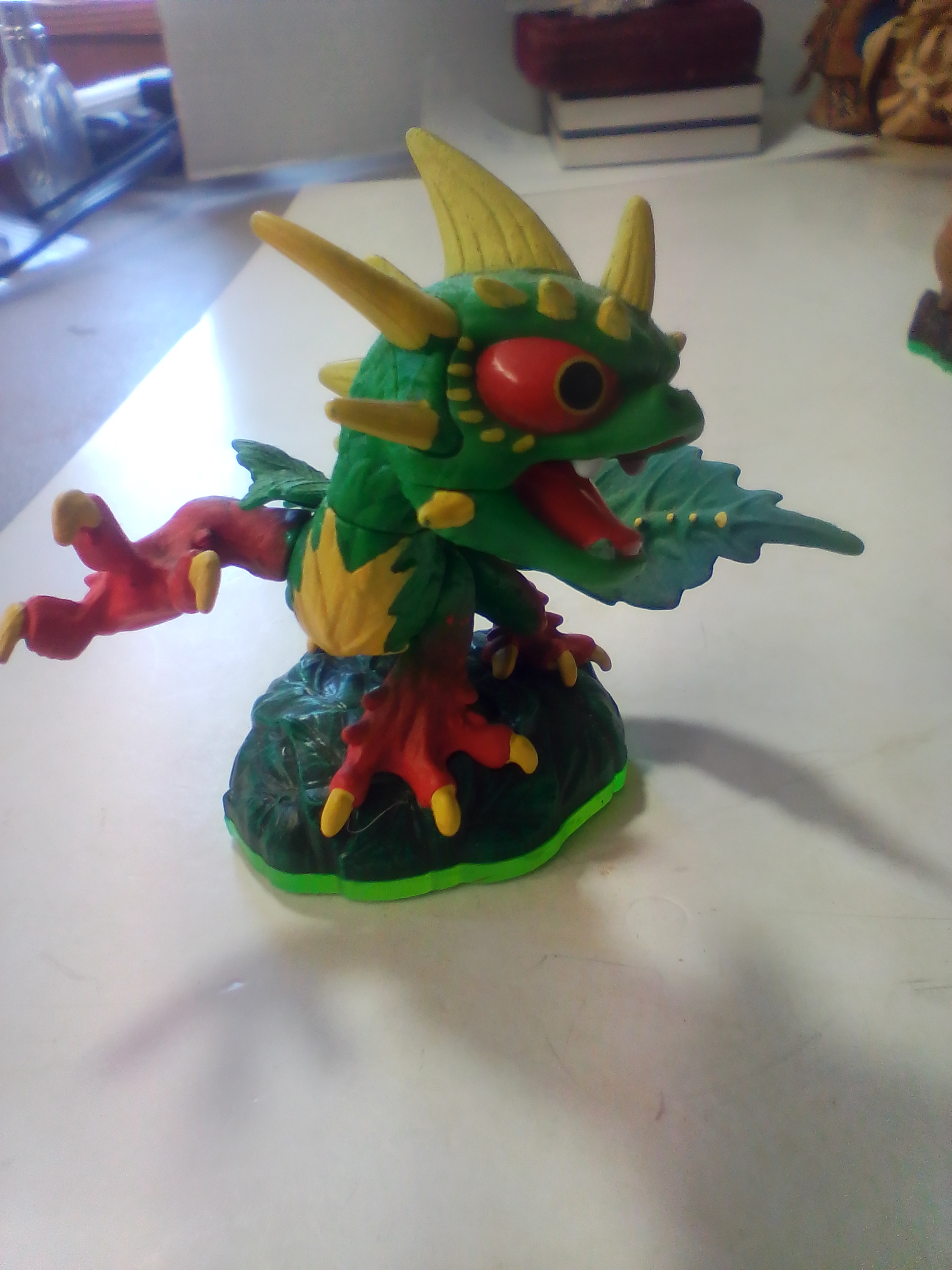 A Collection of Skylanders Interactive Game Figures Including Trap Master Bushwhack