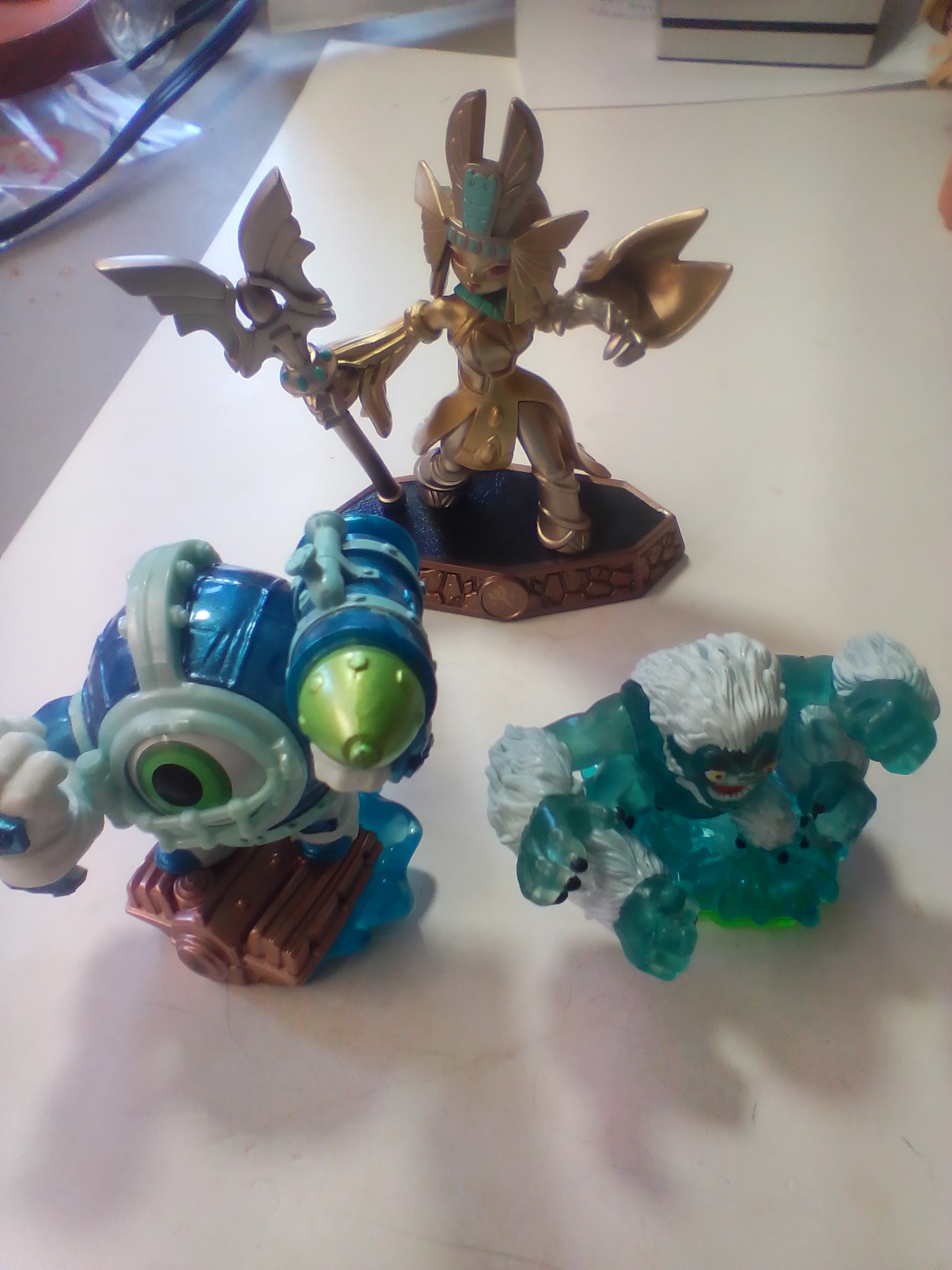 Three Skylanders Video Game Interactive Figures Including Golden Queen, Dive-Clops, and Slam Bam