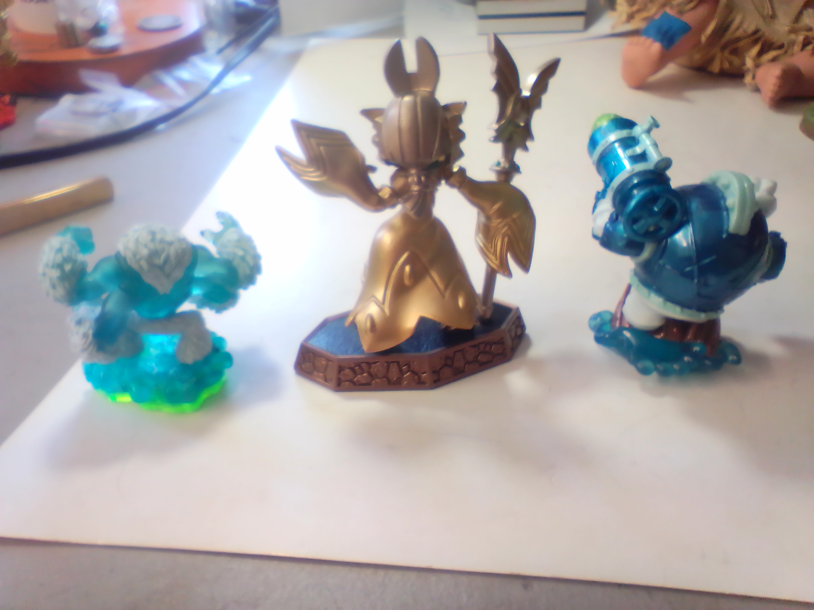 Three Skylanders Video Game Interactive Figures Including Golden Queen, Dive-Clops, and Slam Bam