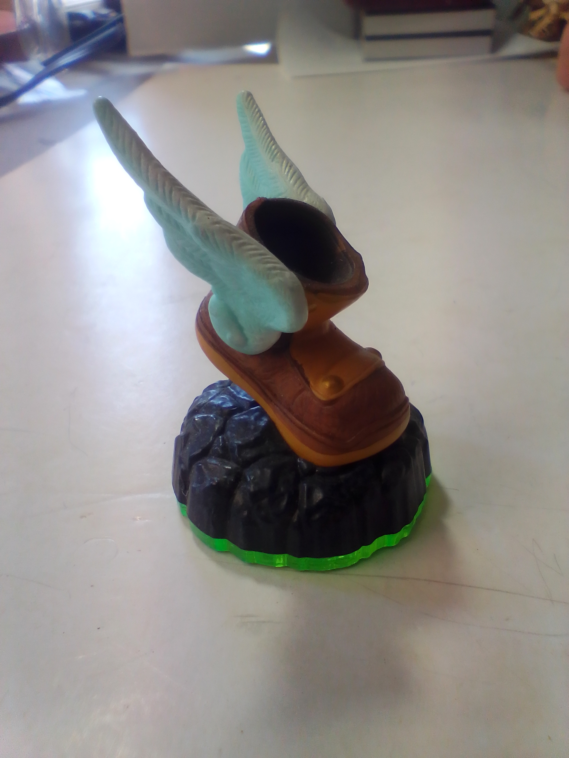 A Collection of Skylanders Interactive Game Pieces and Fire Creation Crystal
