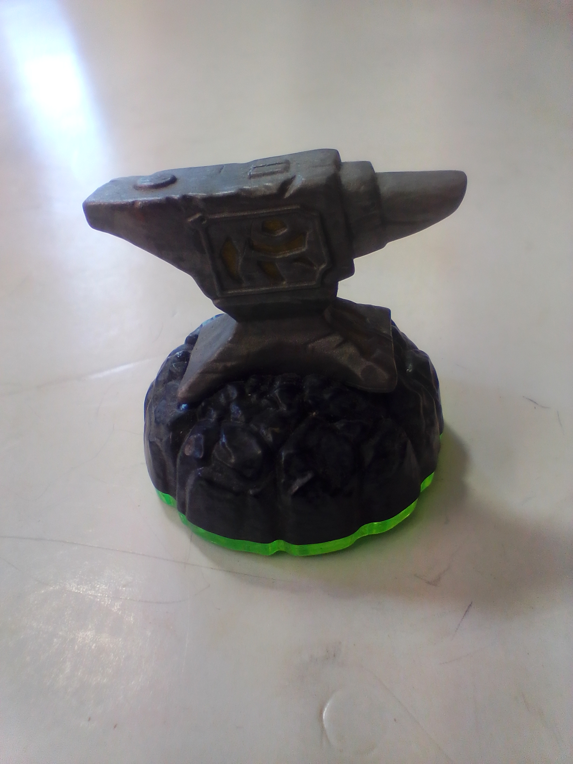 A Collection of Skylanders Interactive Game Pieces and Fire Creation Crystal