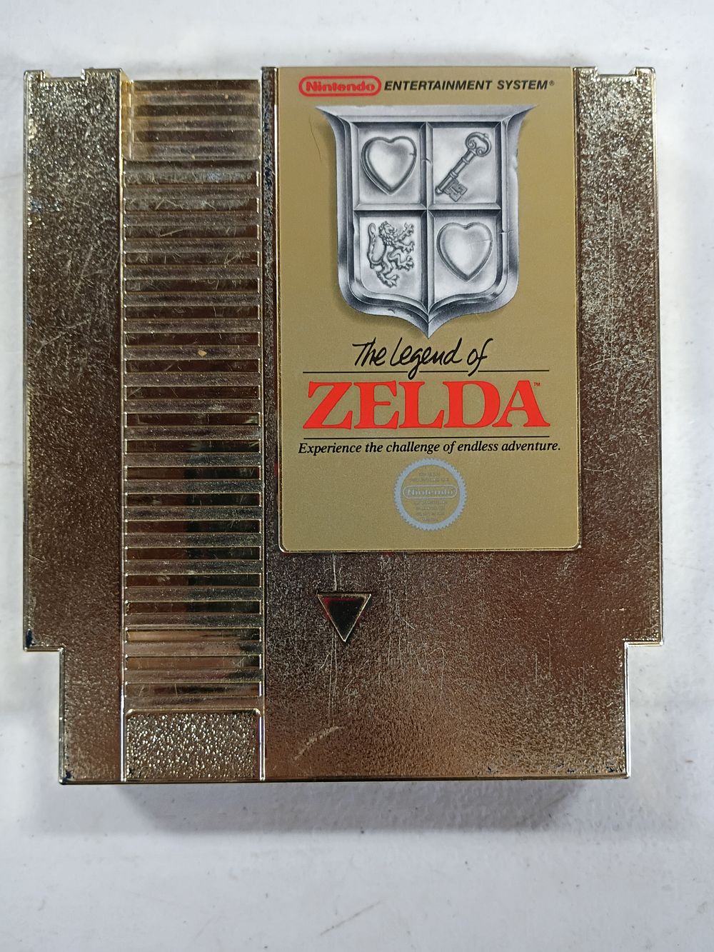 Lot 151: Nintendo Entertainment System The Legend of Zelda Gold Cartridge with Dust Sleeve