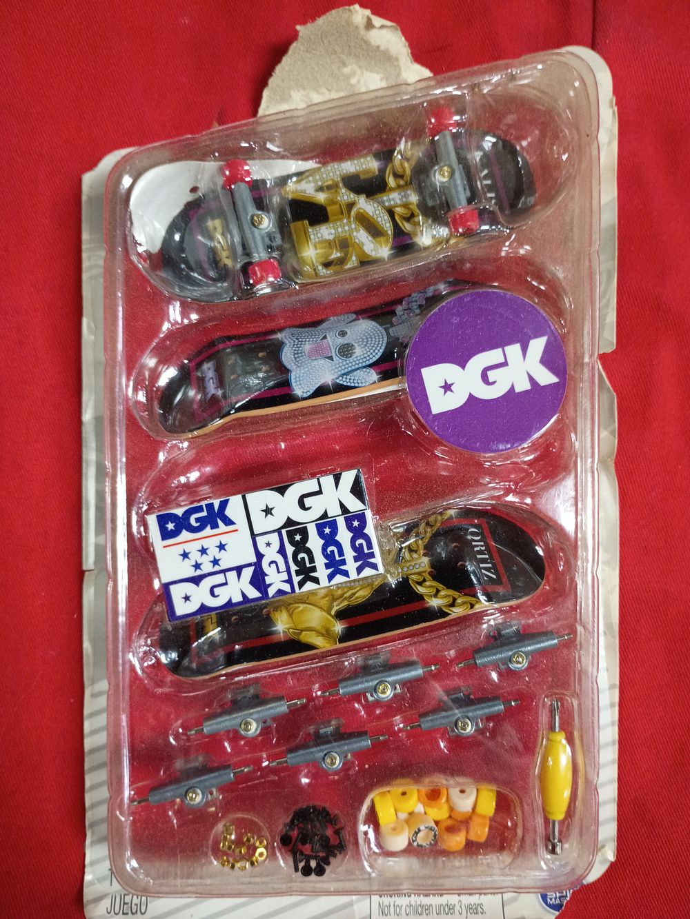 Lot 108: A Set of Tech Deck 96mm DGK Series Fingerboards and Accessories