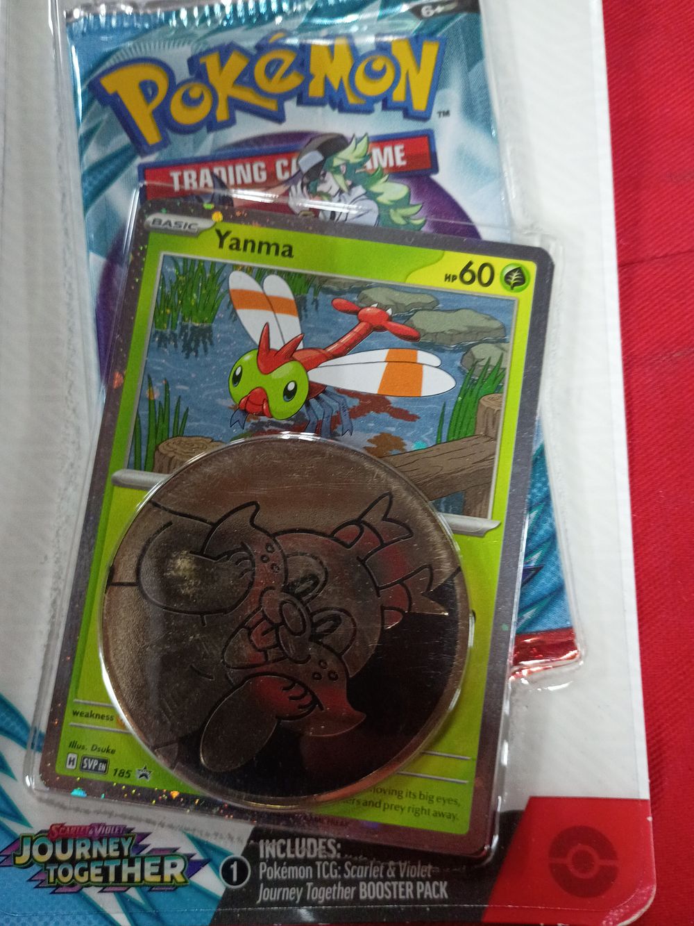Lot 126: Pokemon Trading Card Game Scarlet and Violet Journey Together Sealed Checklane Blister Pack with Yanma Promo Card