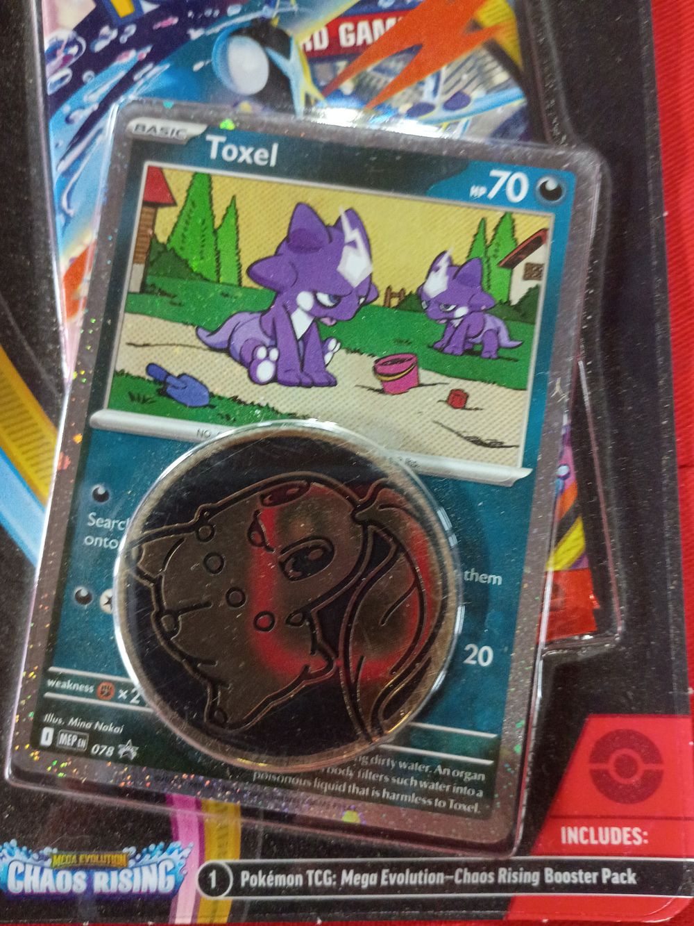 Lot 127: Pokemon Mega Evolution Chaos Rising Checklane Blister Pack with Toxel Promo Card and Chikorita Coin