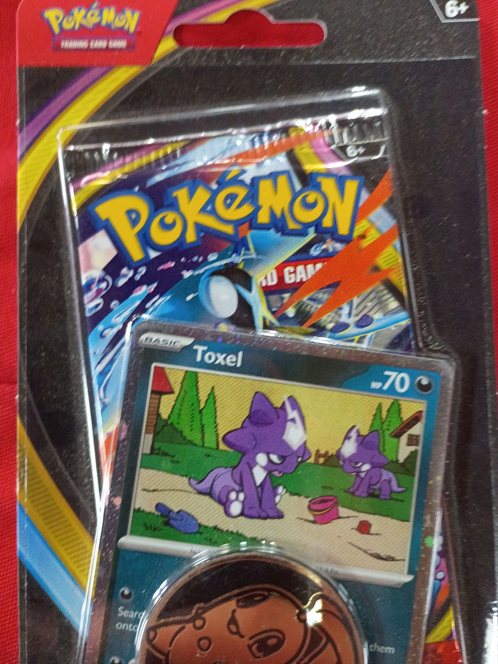 Lot 128: Sealed Pokemon Trading Card Game Blister Pack Chaos Rising Toxel Promo and Coin