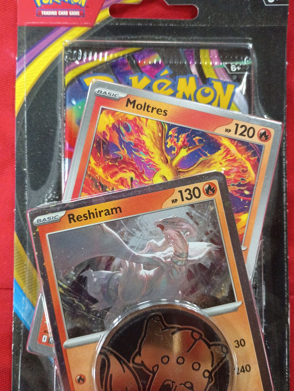 Lot 132: Sealed Mega Evolution Chaos Rising Pokémon TCG 1 Pack Blister with Moltres and Reshiram Promo Cards