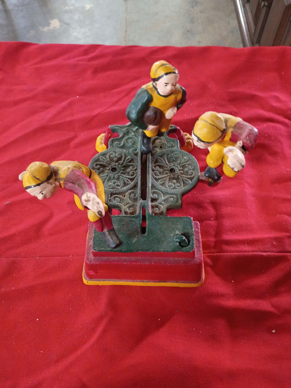 Lot 65: Cast Iron Mechanical Calamity Football Players Coin Bank