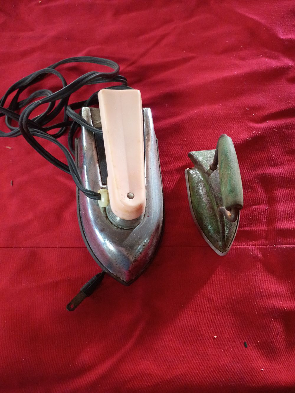 Lot 68: Two Vintage Clothing Irons Including Nassau Electric Travel Iron and Miniature Painted Cast Iron Sample
