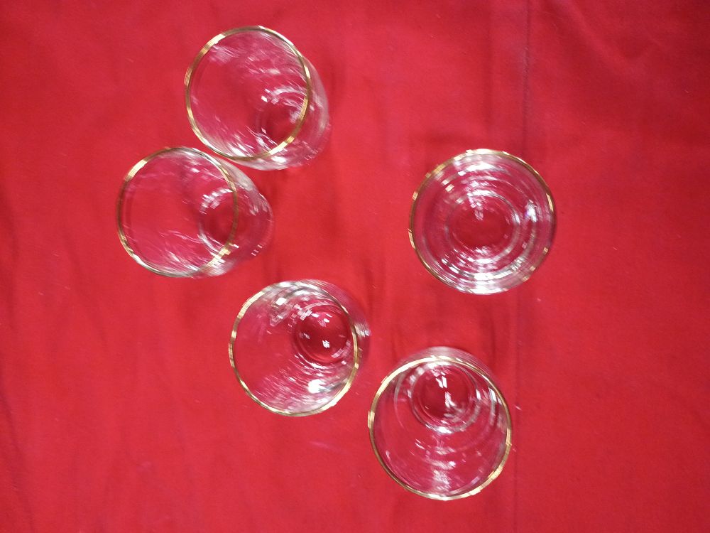 Lot 97: A Set of Five Mid-Century Modern Gold Banded Clear Glass Tumblers