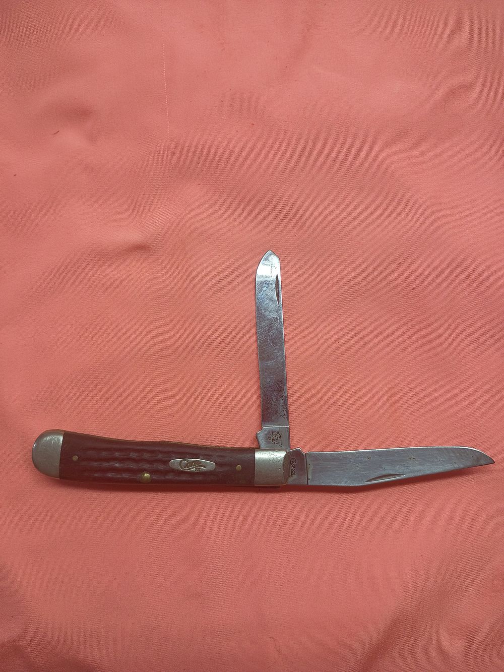 Lot 110: Case XX 6254 SS Trapper Pattern Two Blade Folding Pocket Knife with Jigged Bone Handles