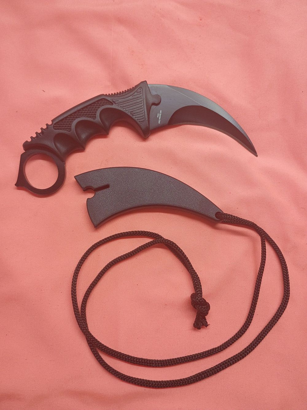 Lot 114: Black Stainless Steel Fixed Blade Karambit Neck Knife with Molded Sheath