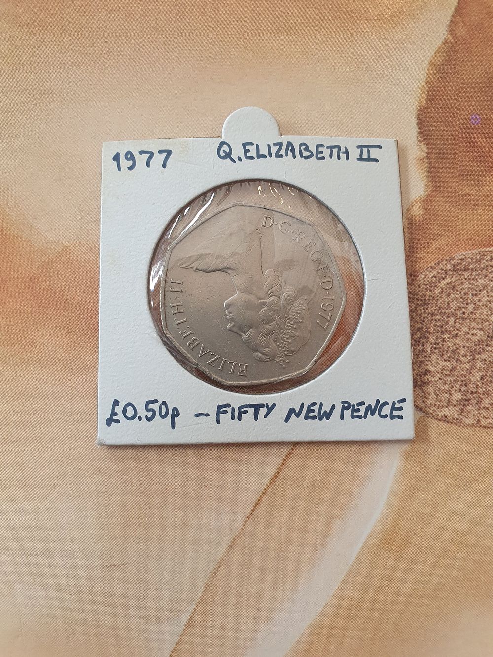 Lot 159: 1977 new 50p