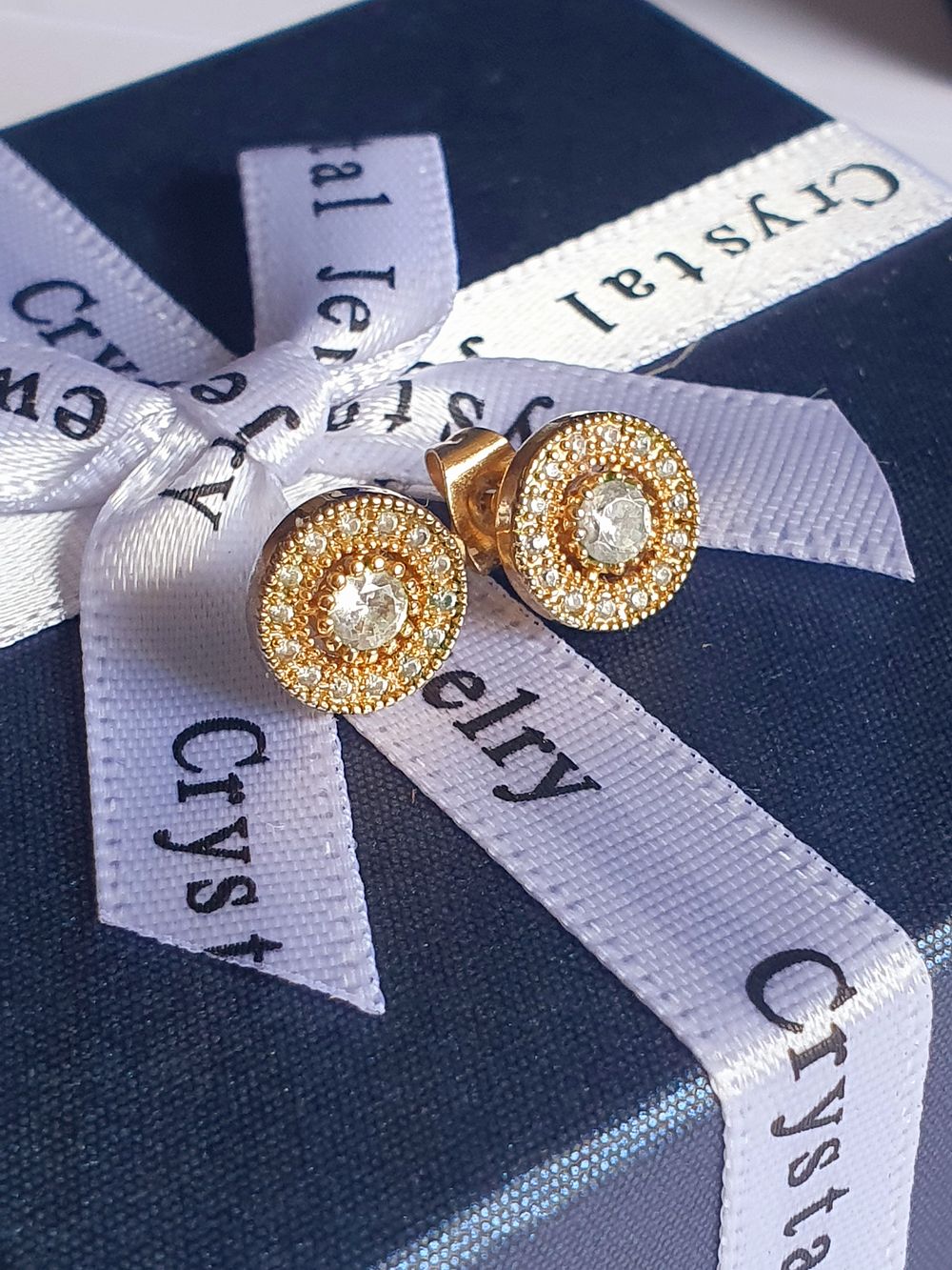 Lot 245: Circular Diamante Stud Earrings