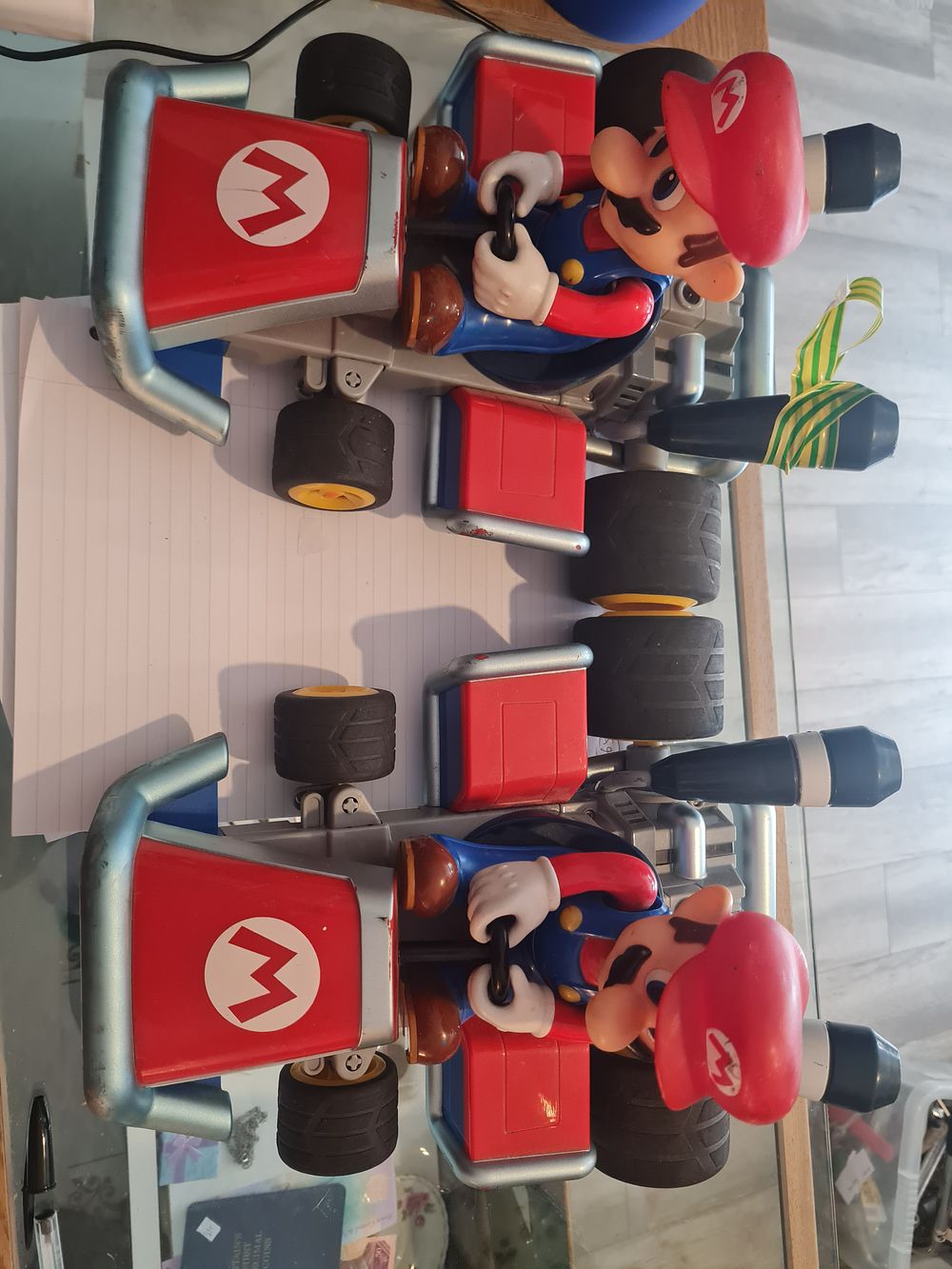 Lot 425: 2 large mario karts with remote