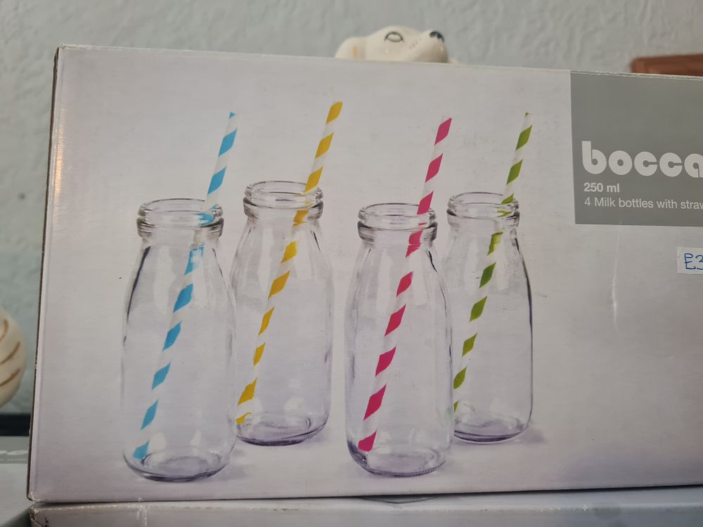 Lot 267: Boxed new milk bottles