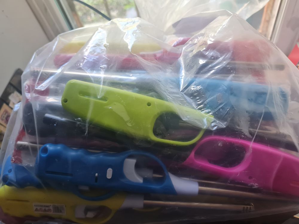 Lot 2e: Bag full of new lighters