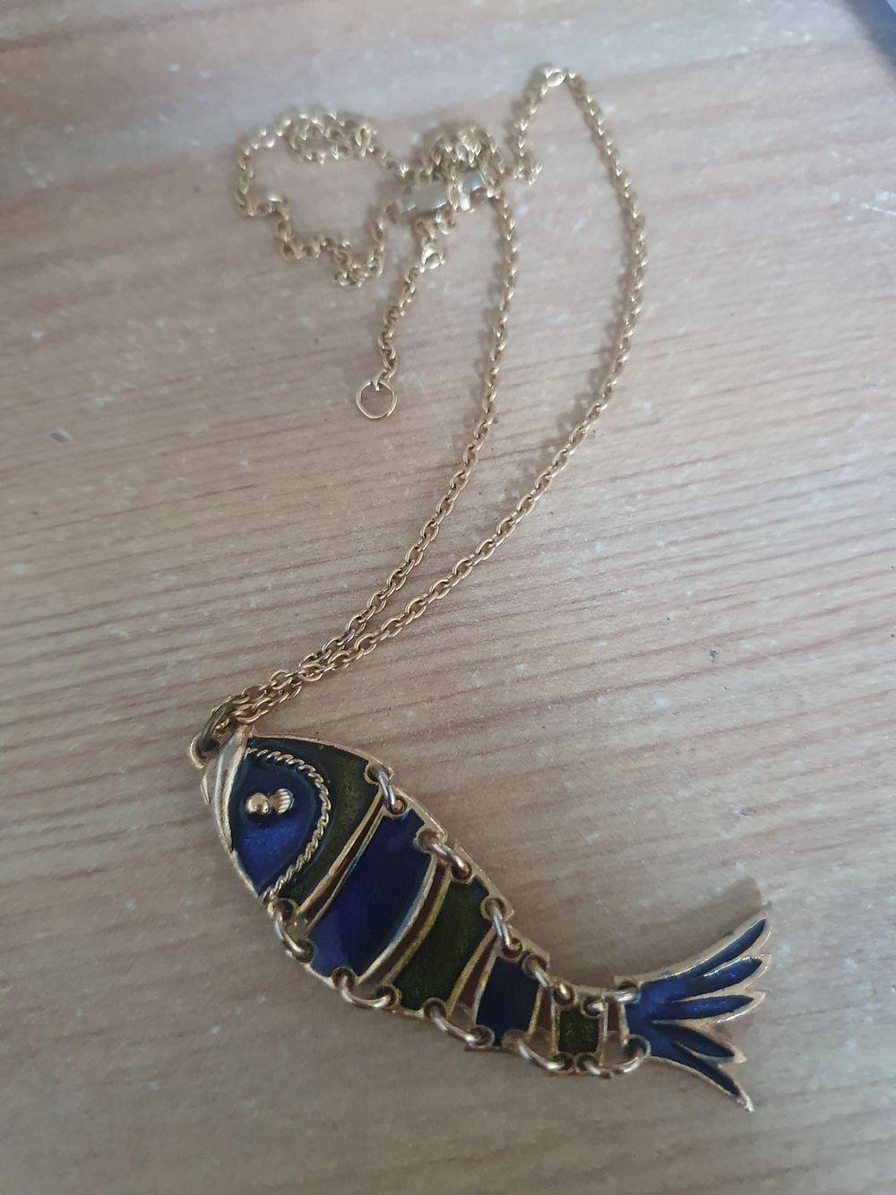 Lot 387: Large fish pendant and chain